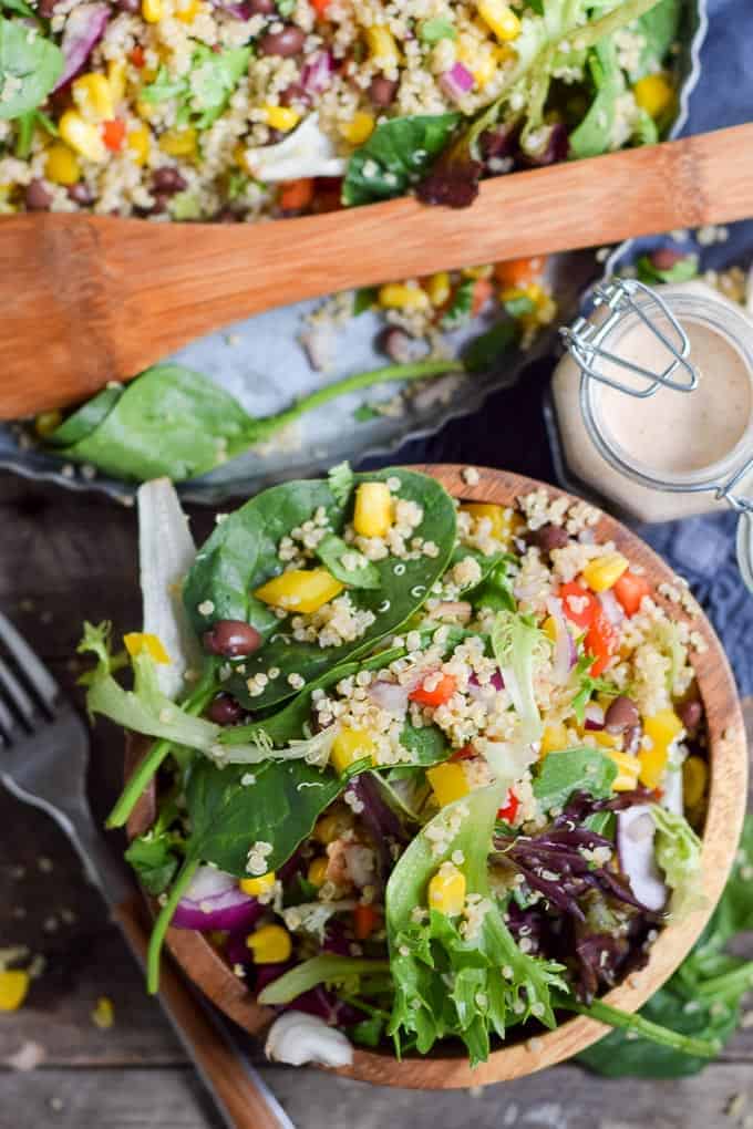 Black Bean Quinoa Summer salad in bowl with tray
