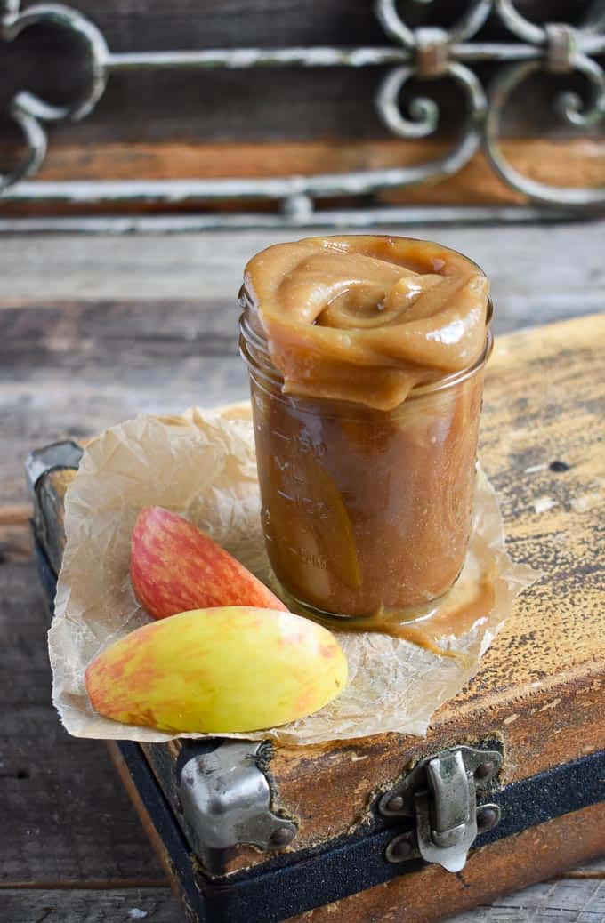 Easy Vegan Date Caramel with apples on table.