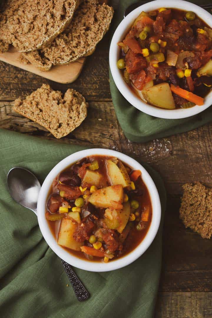 Healthy, hearty, and comforting Instant Pot Vegetable Soup made in 30 minutes. This electric pressure cooker soup recipe is delicious and perfect for those cold and rainy days. Packed with your favorite Fall veggies this soup is also vegan, gluten-free, and oil-free.