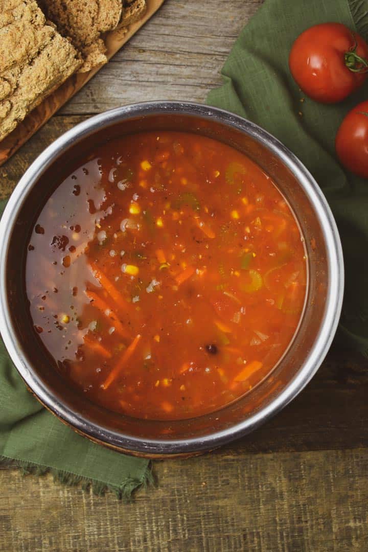 Healthy, hearty, and comforting Instant Pot Vegetable Soup made in 30 minutes. This electric pressure cooker soup recipe is delicious and perfect for those cold and rainy days. Packed with your favorite Fall veggies this soup is also vegan, gluten-free, and oil-free.
