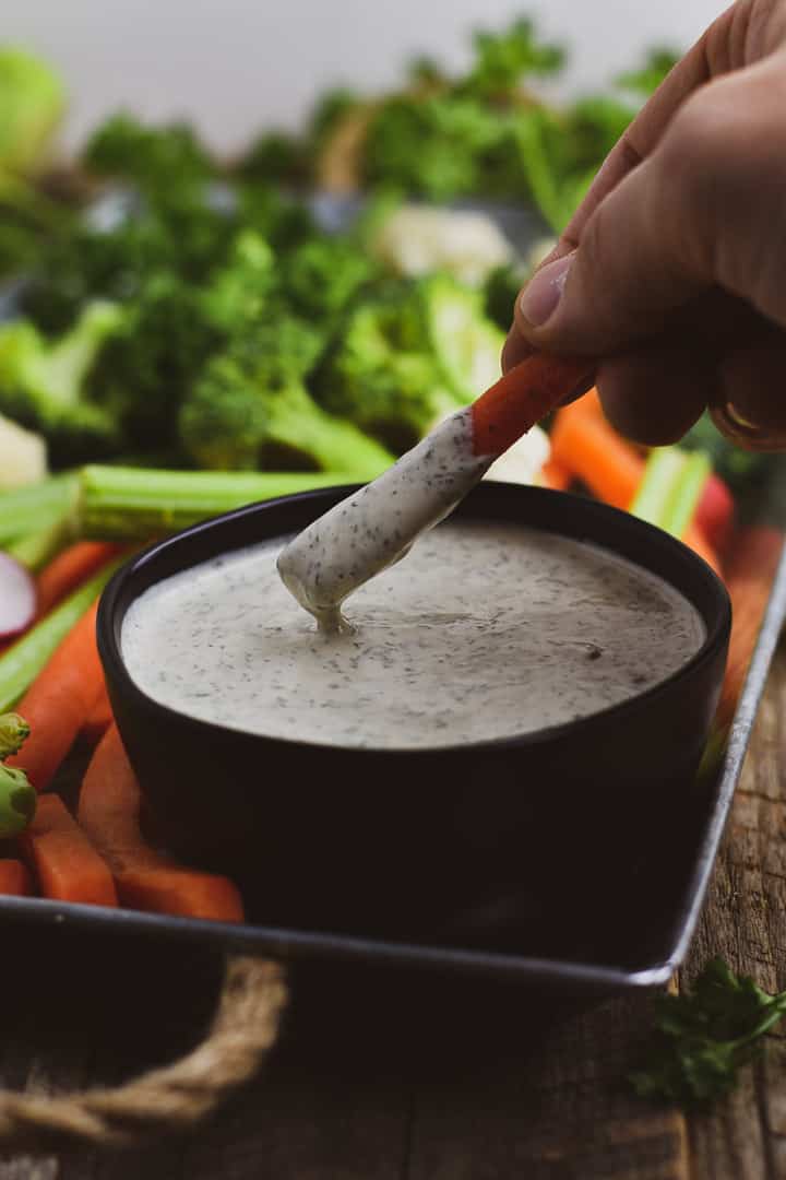 The BEST Vegan Ranch Dressing recipe! This creamy cashew vegan ranch dressing is the perfect party dip, salad dressing, or sandwich spread. It's completely plant based, oil-free, gluten free, and soy free.