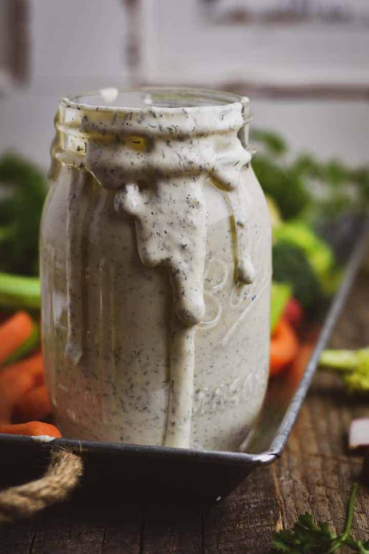 The BEST Vegan Ranch Dressing recipe! This creamy cashew vegan ranch dressing is the perfect party dip, salad dressing, or sandwich spread. It's completely plant based, oil-free, gluten free, and soy free.