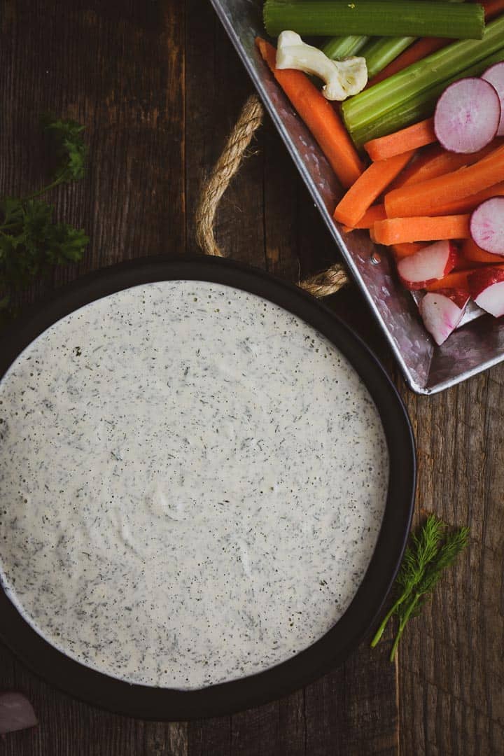 The BEST Vegan Ranch Dressing recipe! This creamy cashew vegan ranch dressing is the perfect party dip, salad dressing, or sandwich spread. It's completely plant based, oil-free, gluten free, and soy free.