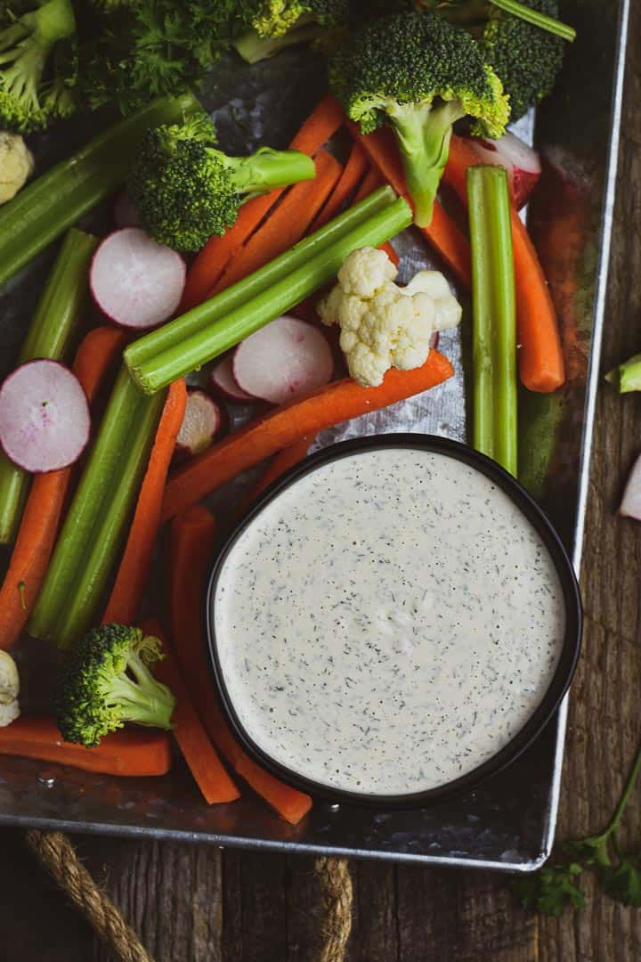 The BEST Vegan Ranch Dressing recipe! This creamy cashew vegan ranch dressing is the perfect party dip, salad dressing, or sandwich spread. It's completely plant based, oil-free, gluten free, and soy free.