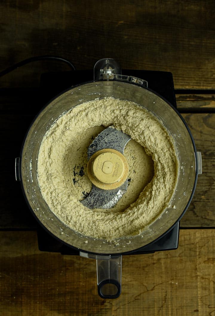 Food processor with ground up cashews.