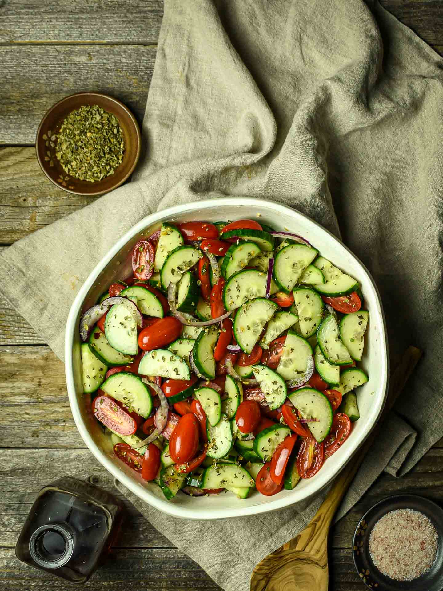 Tomato Cucumber salad in large bowl.