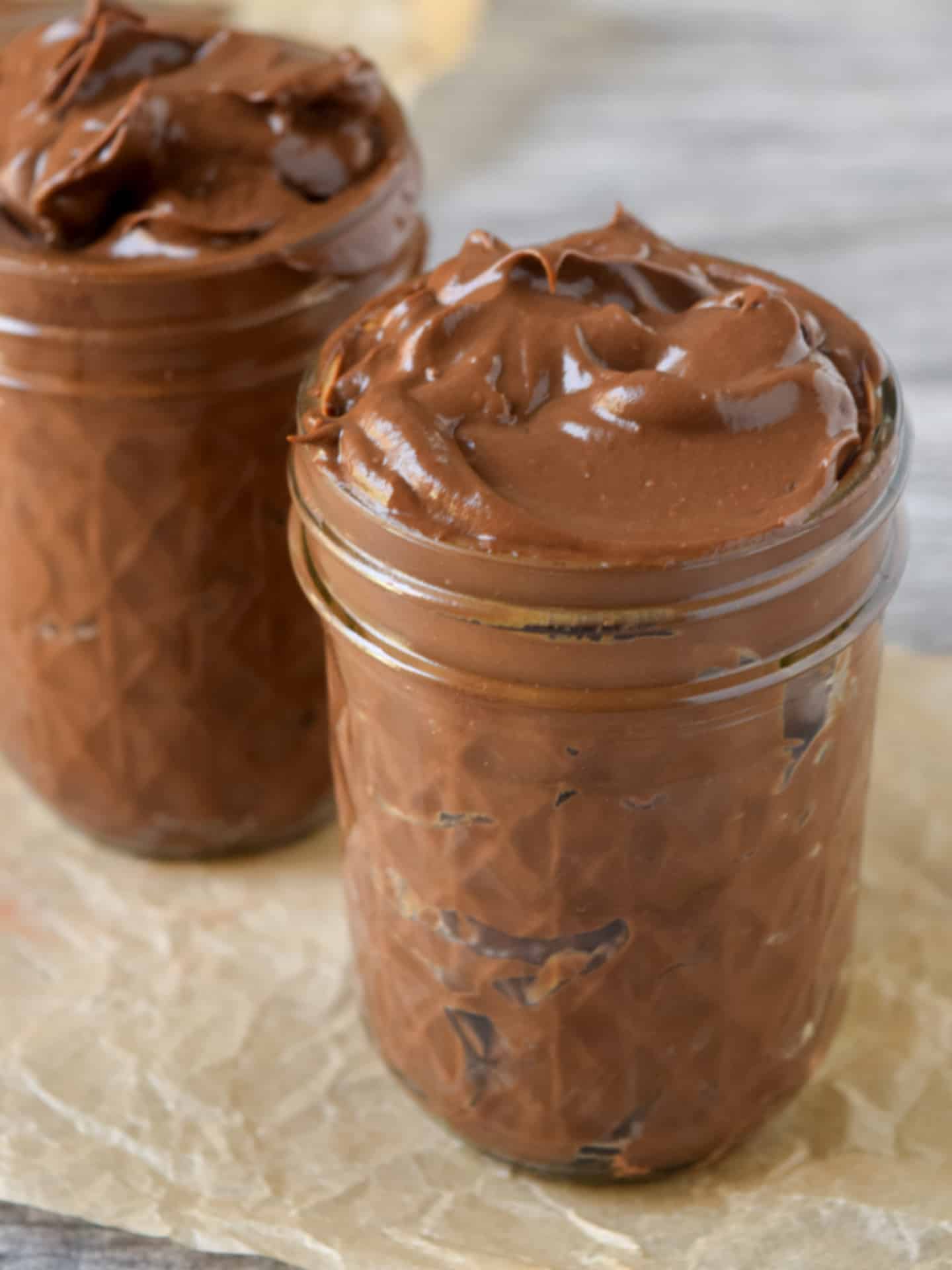Avocado chocolate pudding in glass jar.