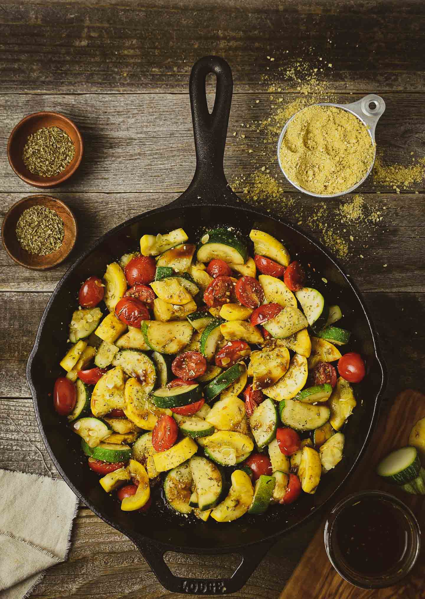 This Vegan Summer Squash Sauté is healthy, delicious, and so easy to make. It's made with yellow squash, zucchini, cherry Tomatoes, and vegan parmesan in one skillet. And, it's completely oil-free. 