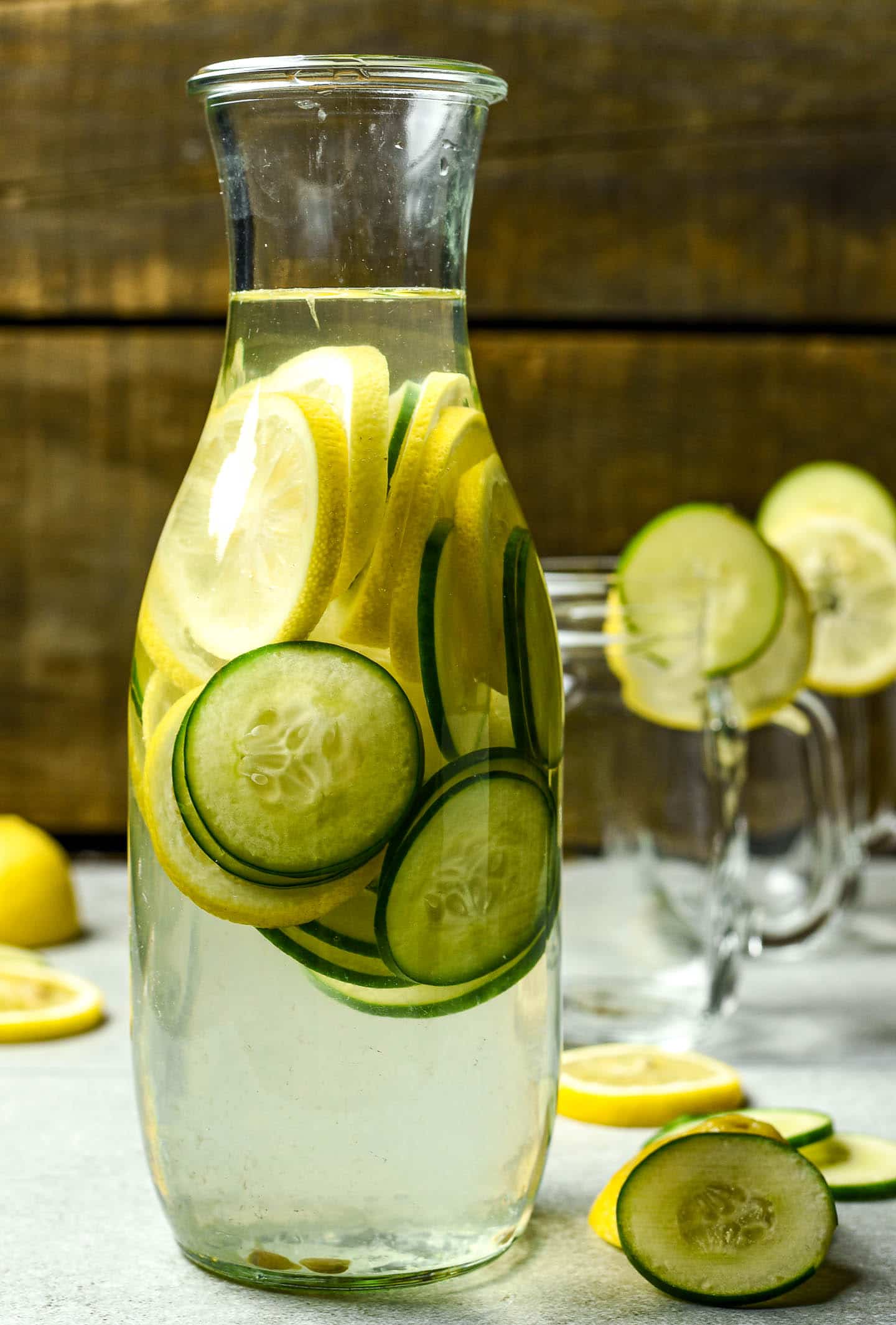 Deliciously refreshing lemon cucumber water made with only lemons, cucumbers, and water. Garnish with fresh mint or berries of your choice. Perfect day or night.