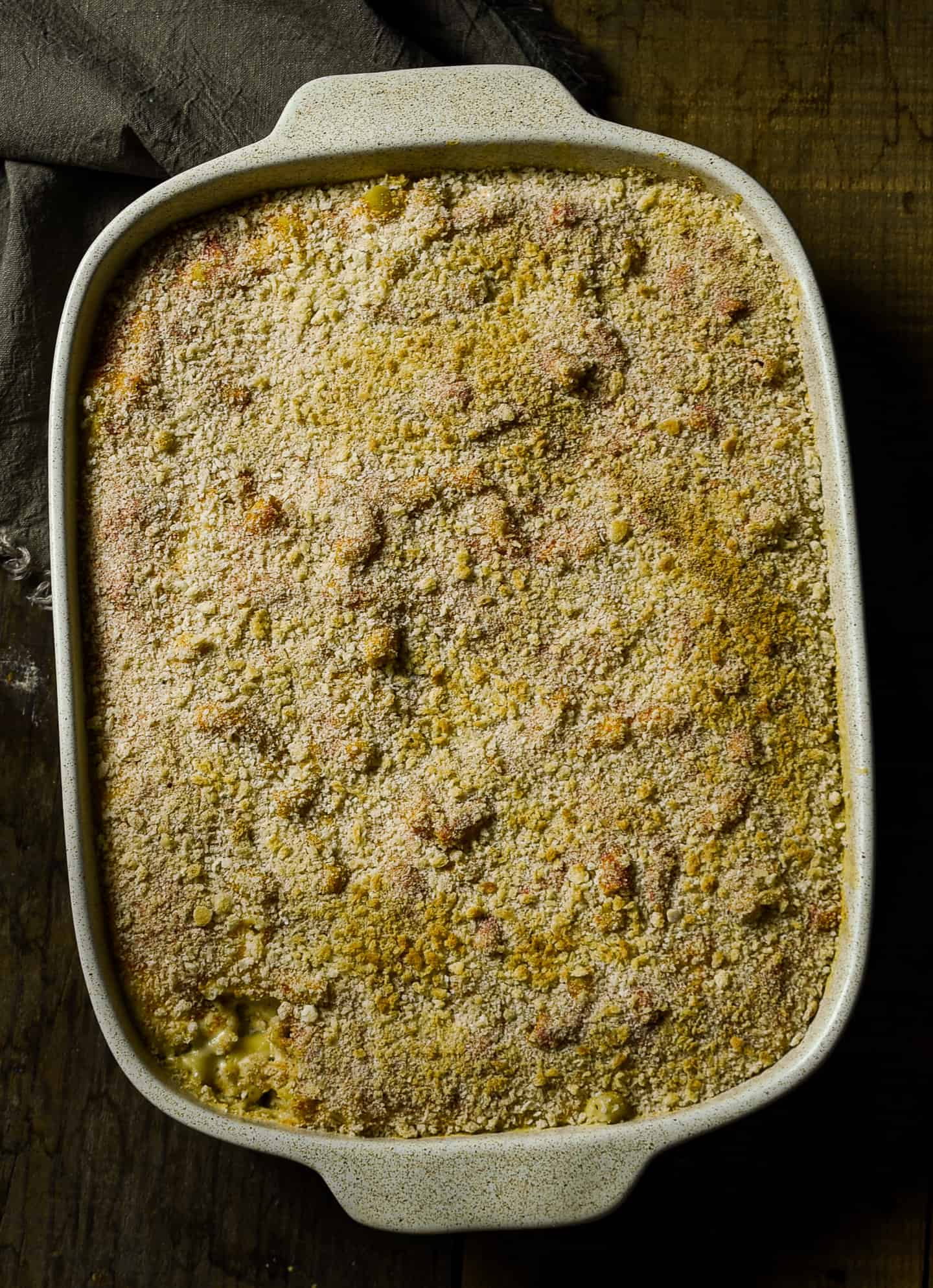 Baked vegan mac and cheese in casserole dish.