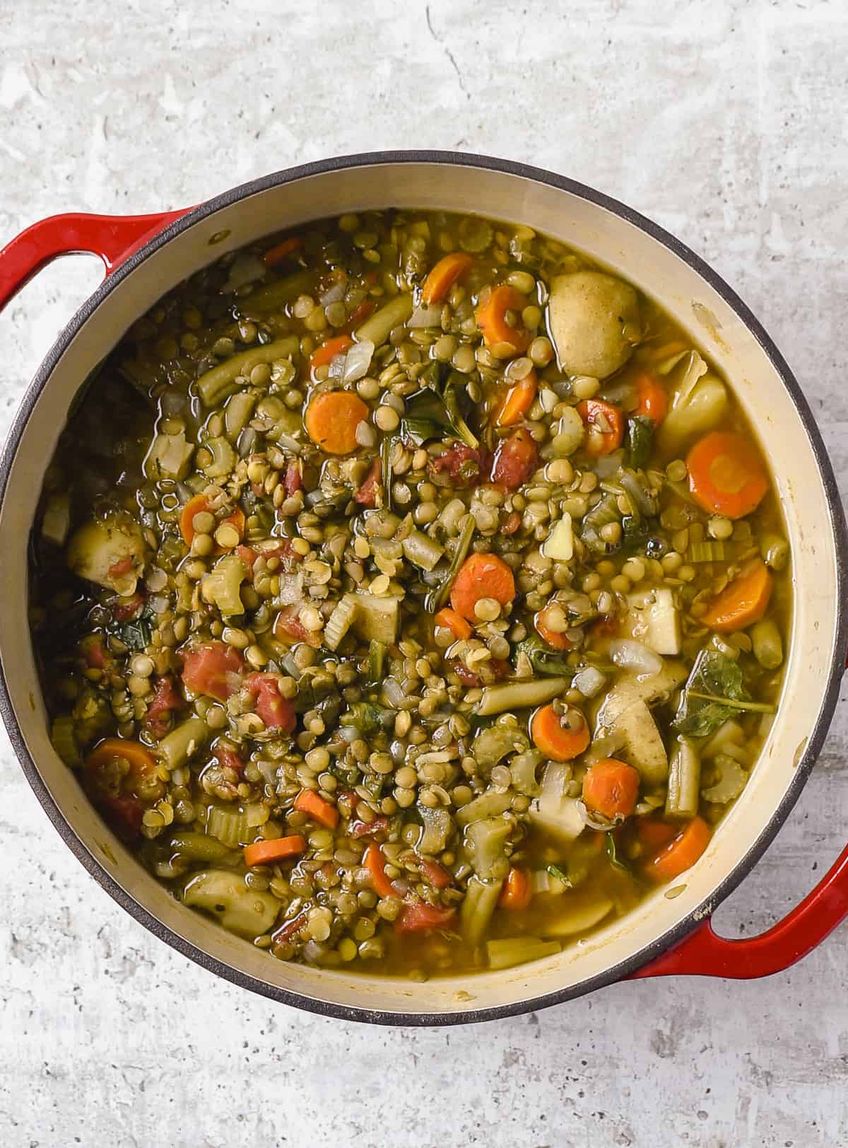 Vegetable lentil soup in dutch oven.