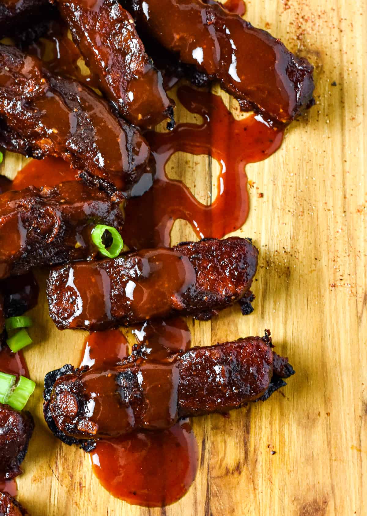 tempeh ribs covered in bbq sauce.