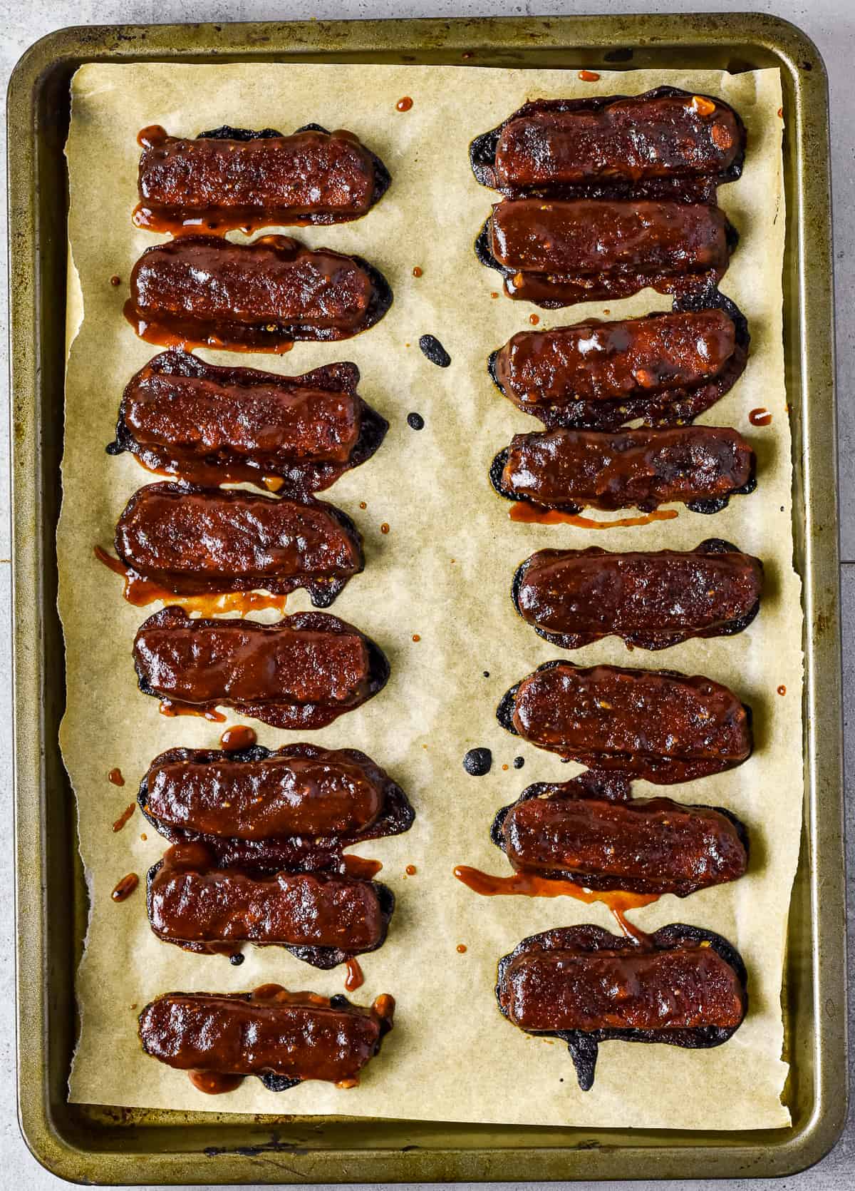 vegan tempeh ribs on baking sheet.