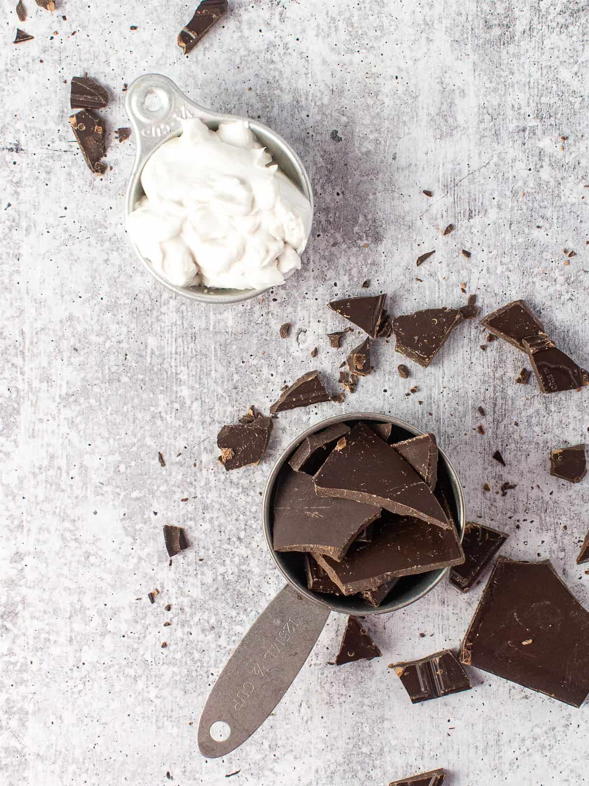 chocolate pieces and coconut milk in measuring cups.