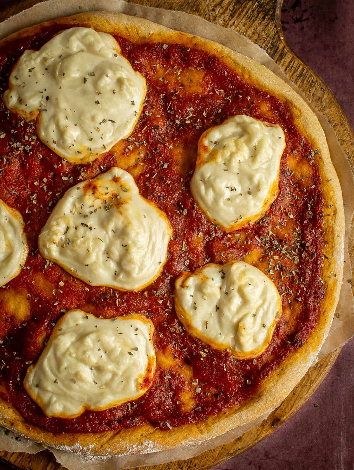 vegan mozzarella on top of pizza.