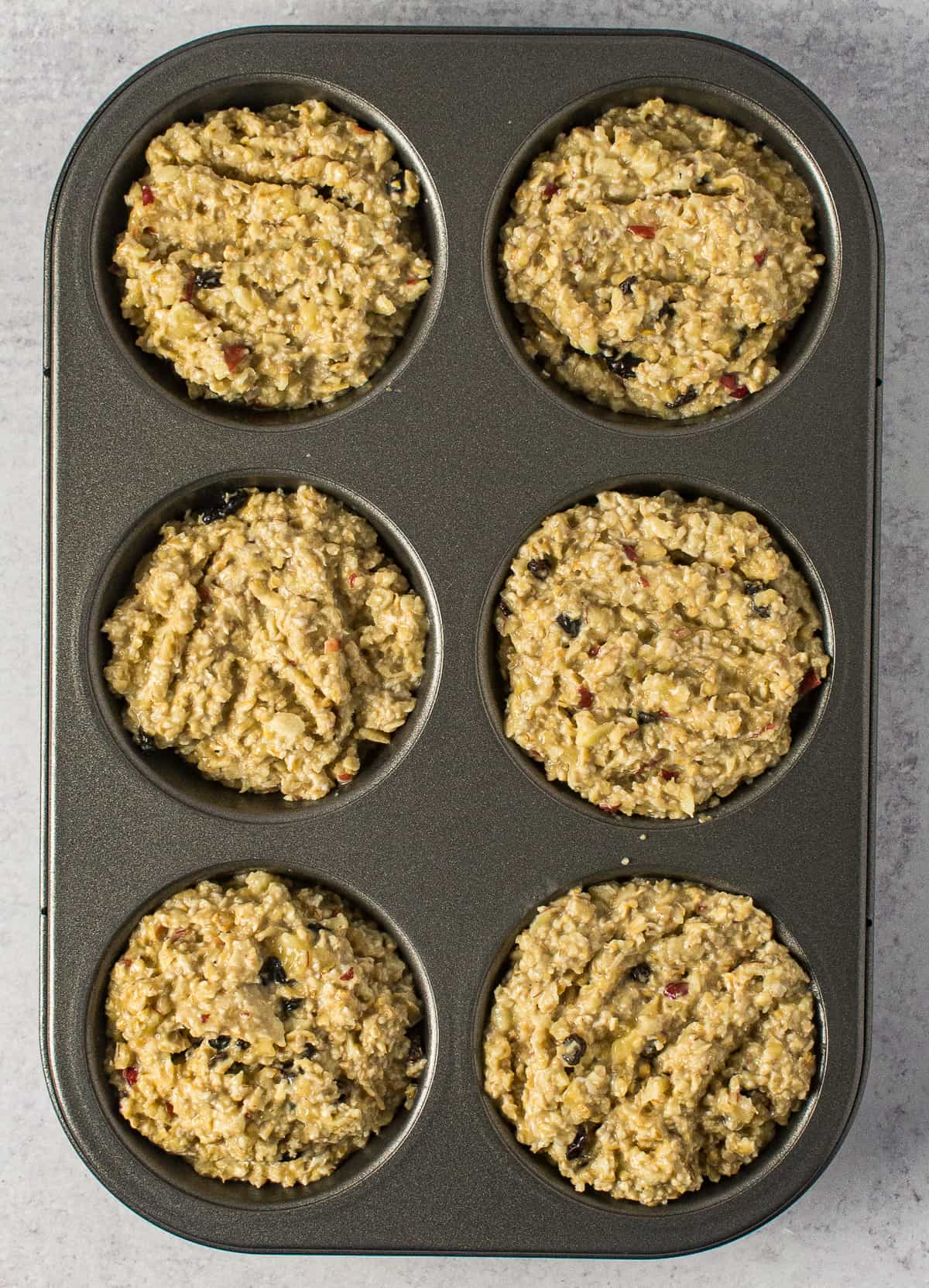 muffin mix in muffin pan