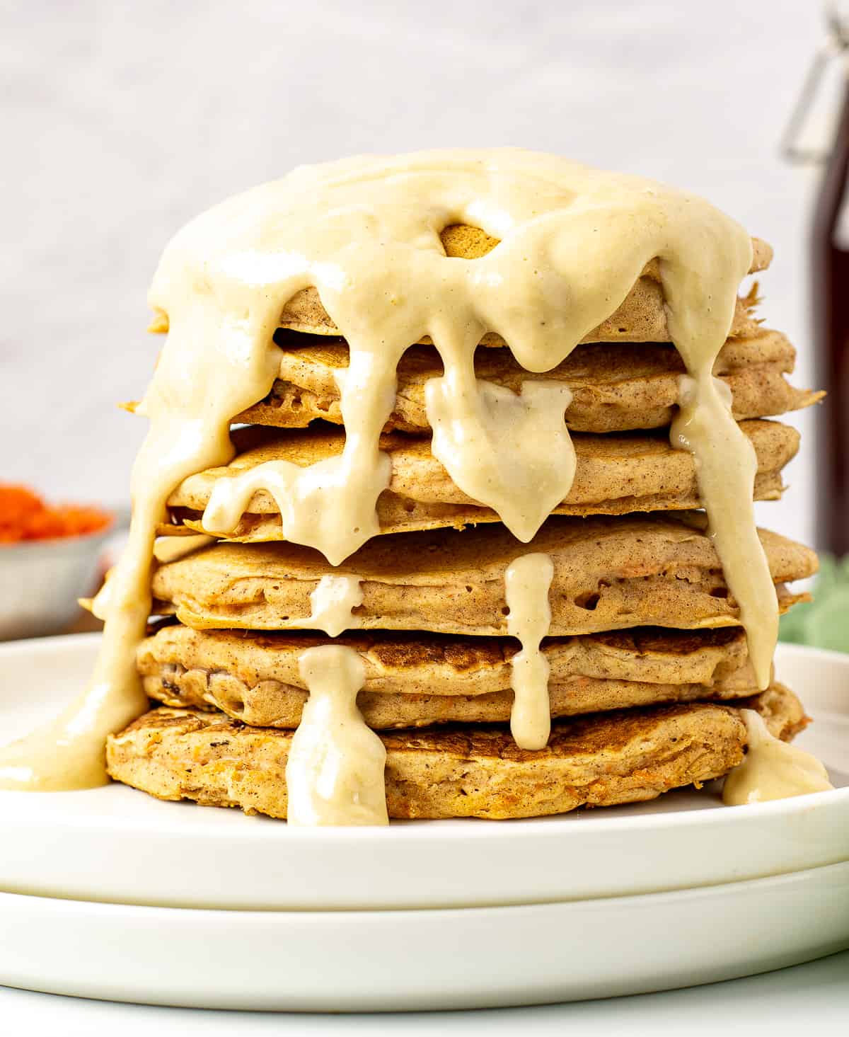 carrot cake pancakes with vegan cream cheese frosting