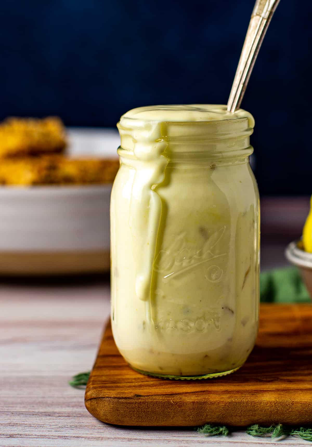 easy vegan tartar sauce in glass jar with spoon