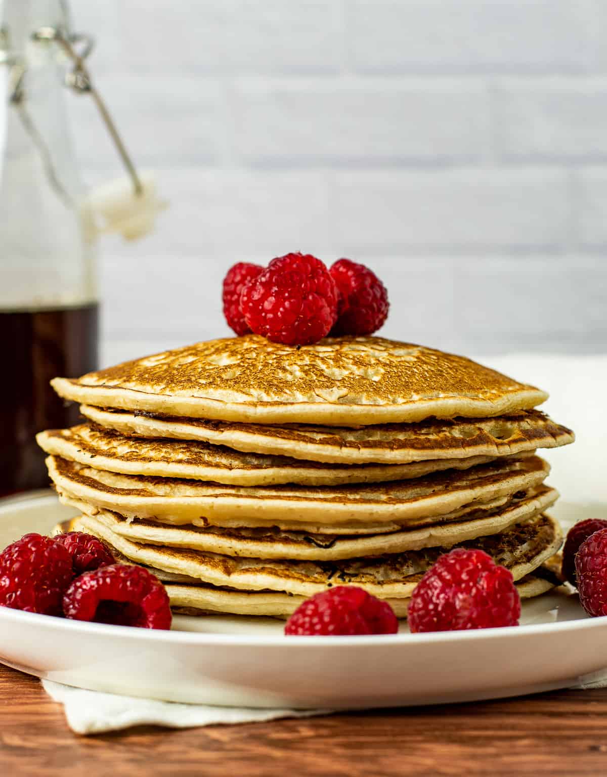 Vegan pancakes with raspberries on top