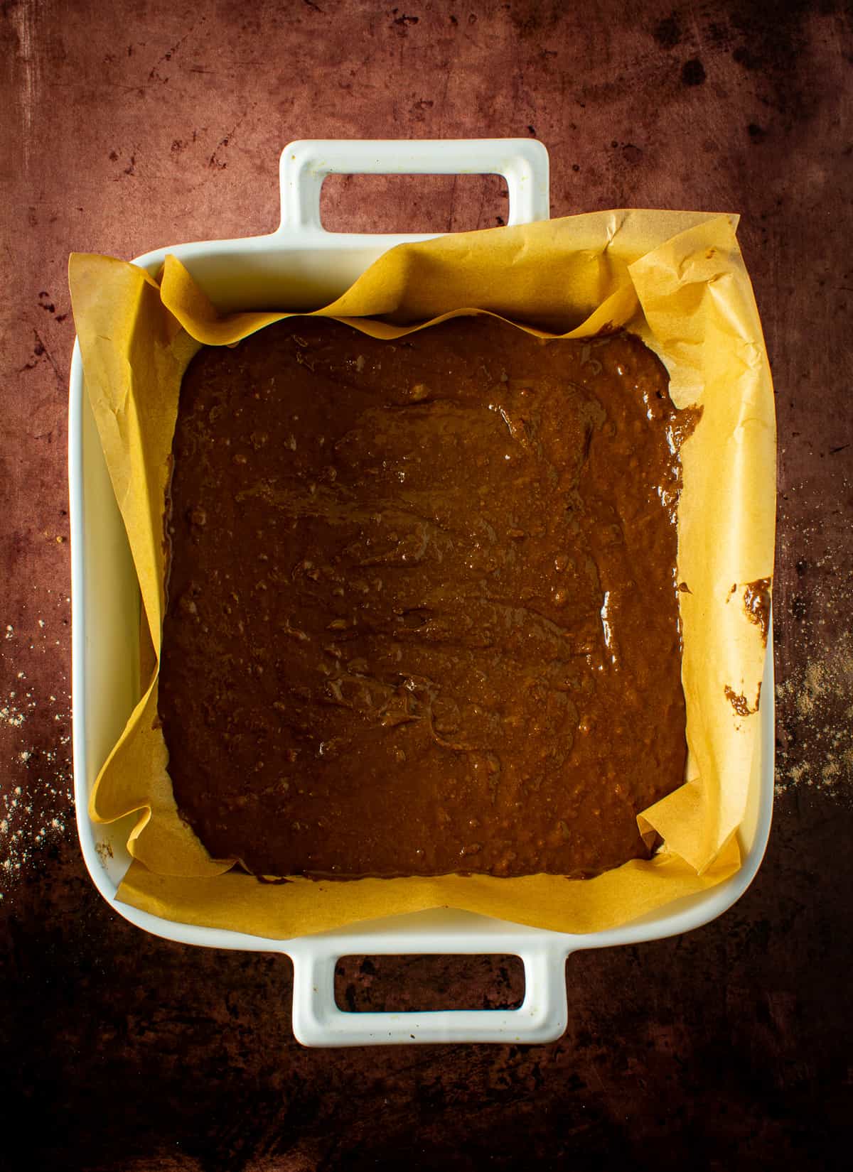 vegan brownie batter in baking dish.