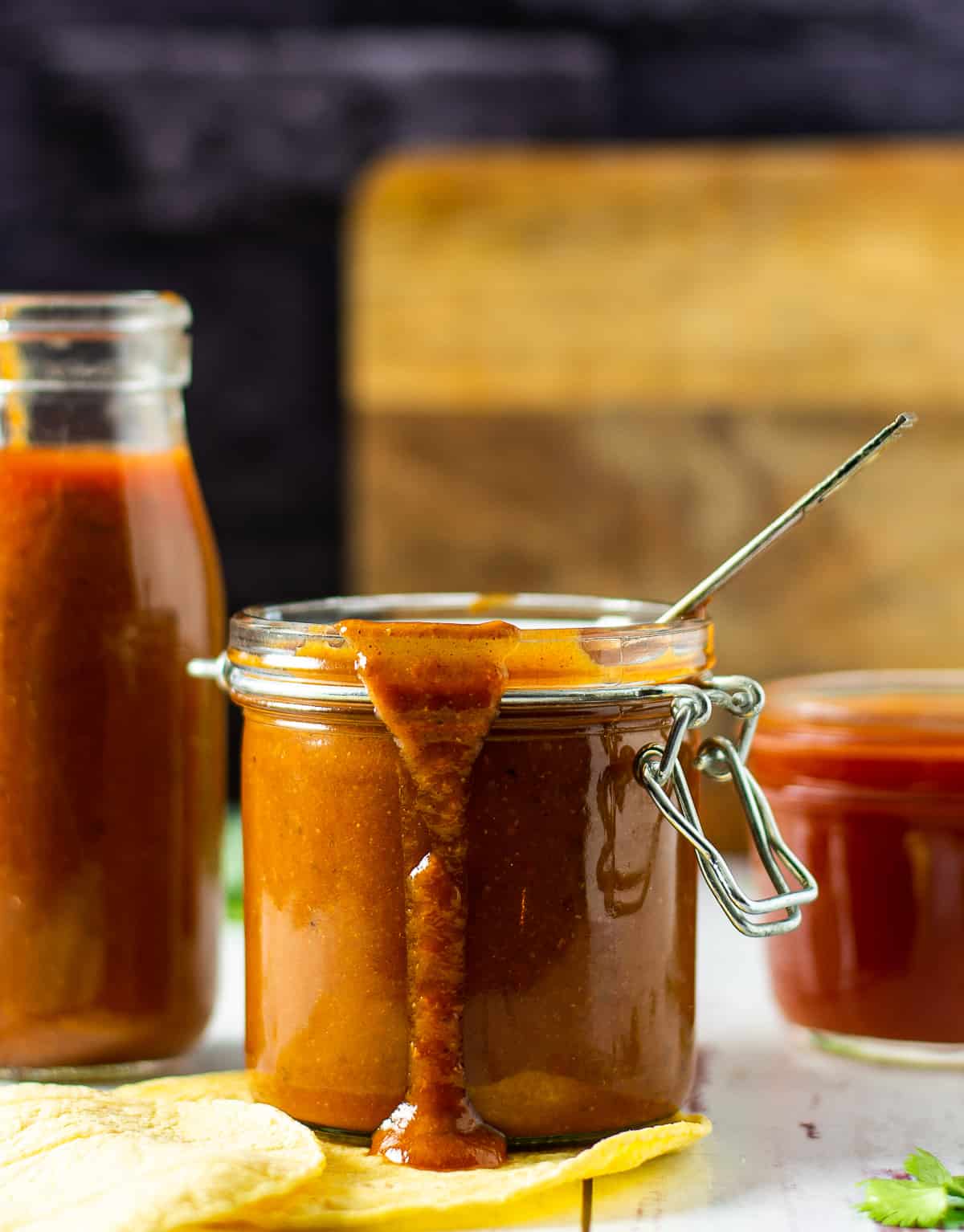 vegan enchilada sauce in glass jar.