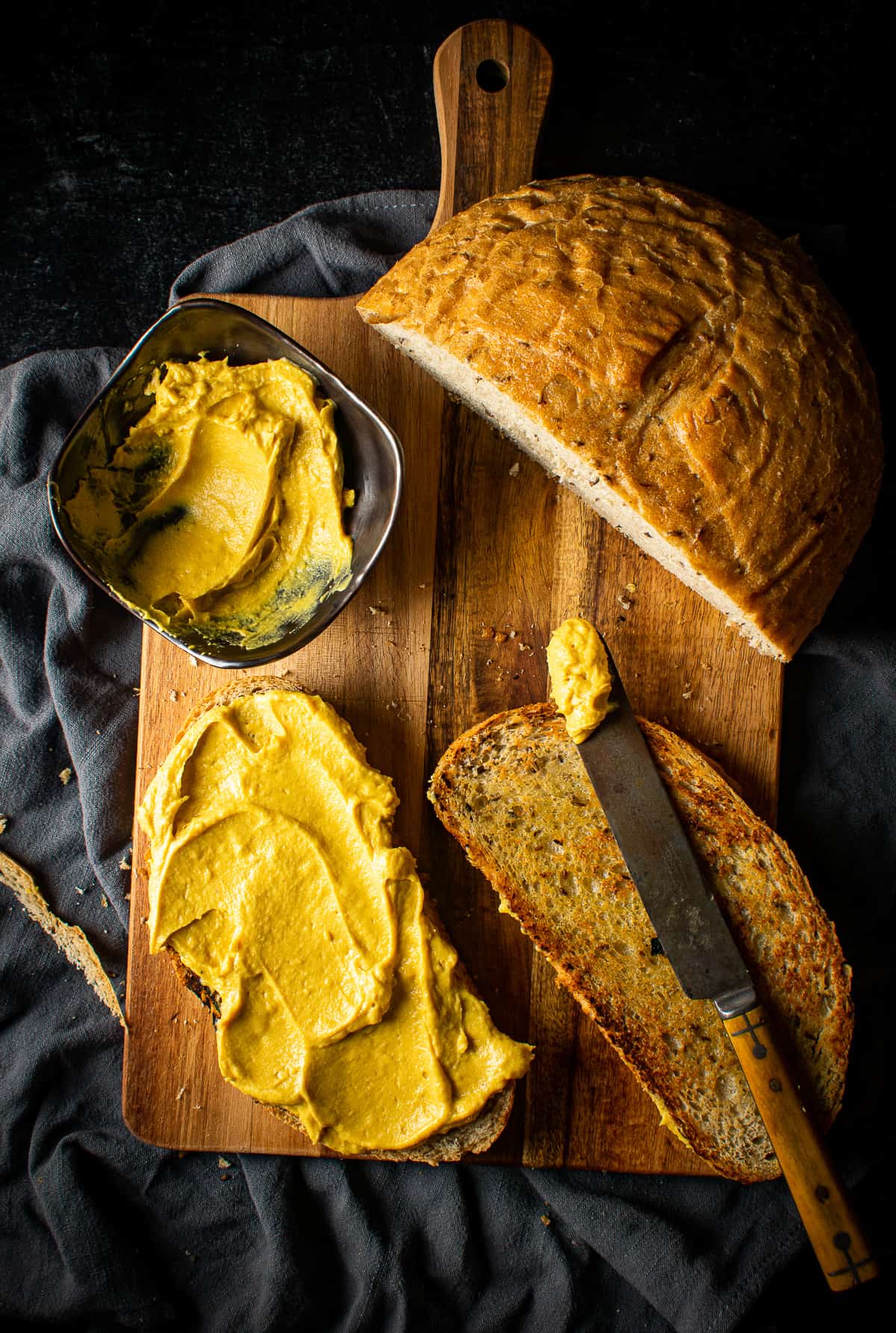 vegan cheddar cheese spread on bread