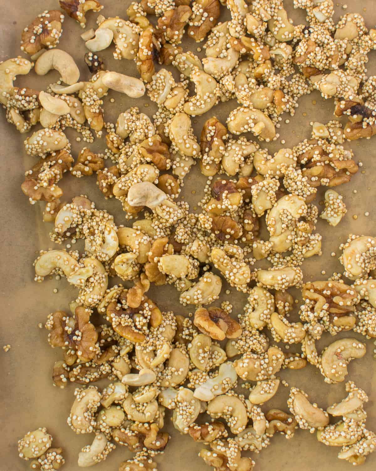 nuts and quinoa on baking sheet