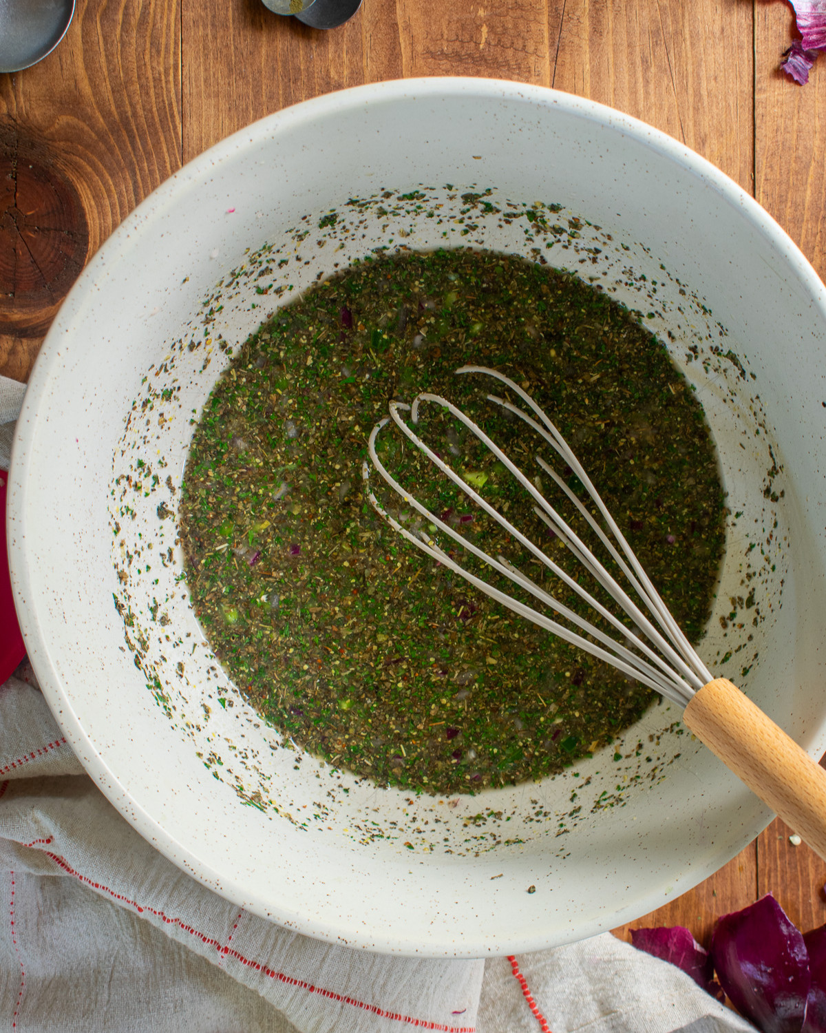 Ingredients being whisked in mixing bowl.