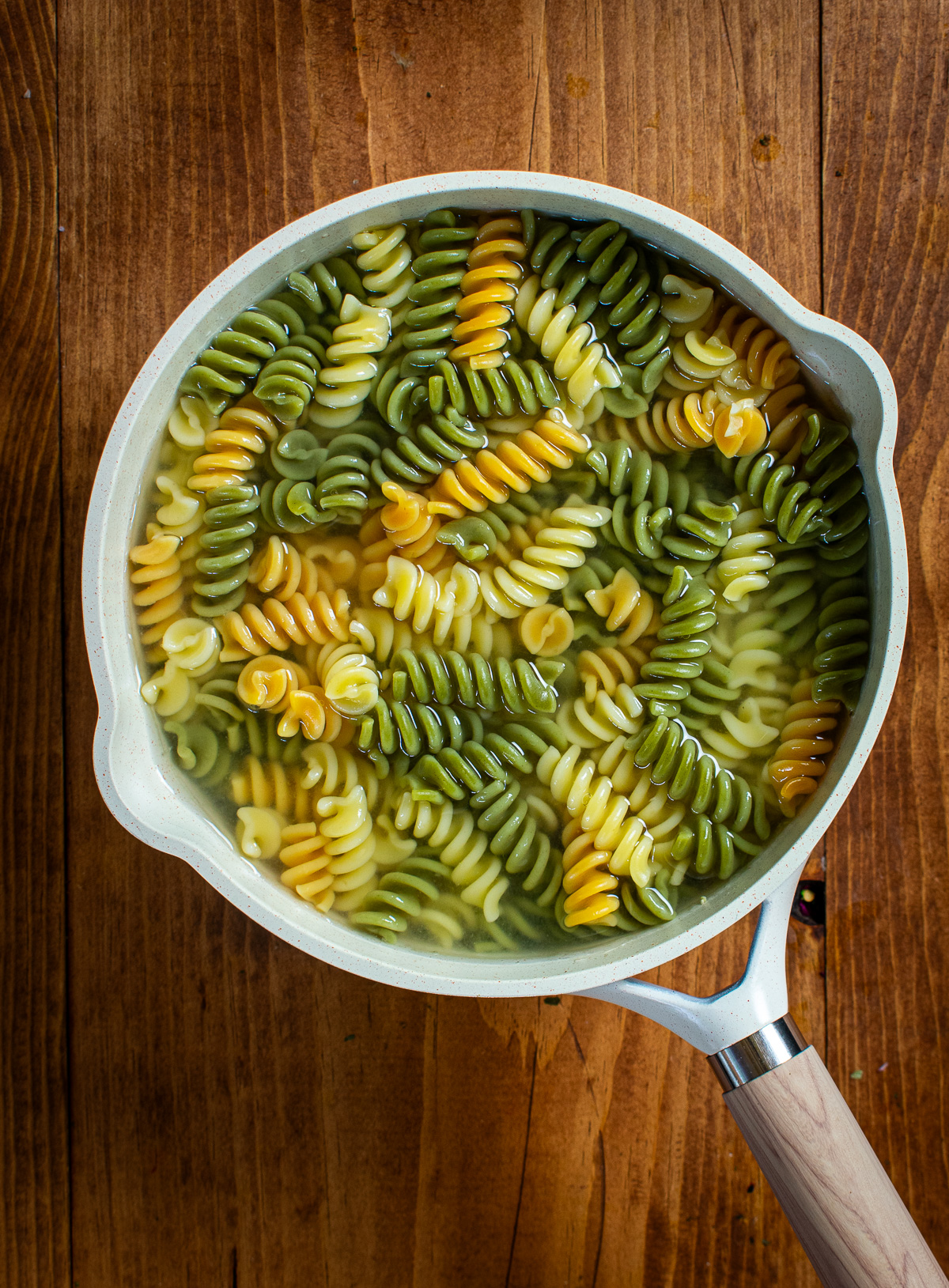Cooked pasta in sauce pan.